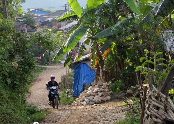 Hmong men on motorbikes, tavan village sapa valley,