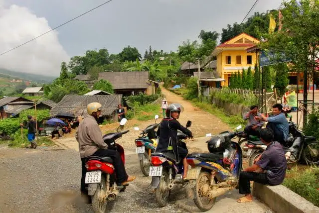 Hmong men on motorbikes, Tavan village sapa valley, hmong village sapa, hmong culture