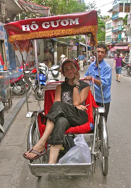rickshaw in vietnam, grrrltraveler in vietnam, hanoi rickshaw