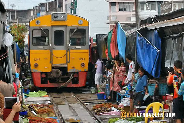 maeklong train market thailand