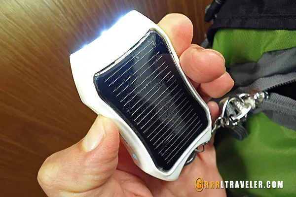 Solar powered external battery charger with USB connection, earth-friendly charger review, travel technology and gadgets