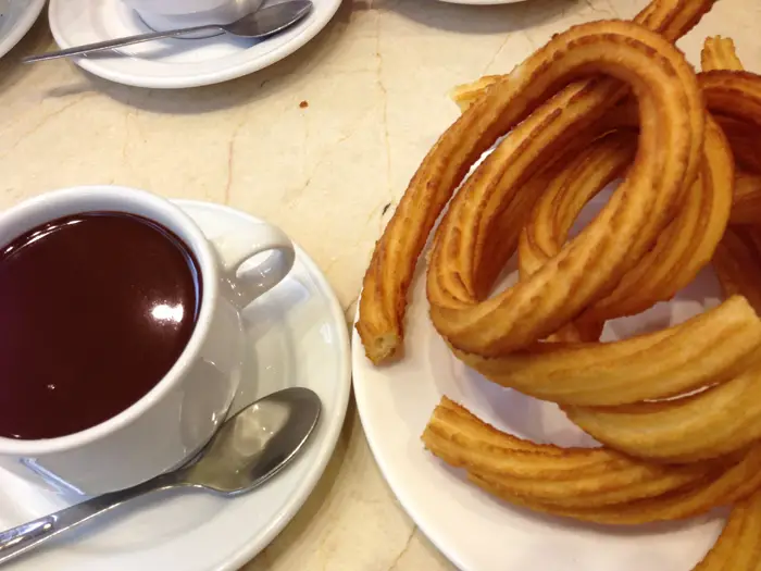 must try food in spain, chocolate con churros, spanish breakfast, spanish food, Churros, Women on the road blog, Must Try Foods , top foods around the world, popular foods around the world