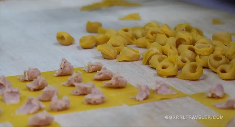 Watch or learn how Tortellini pasta is made