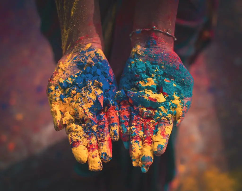 Female solo travel tours, Holi painted hands, India Holi Festival Tour for Solo Travelers