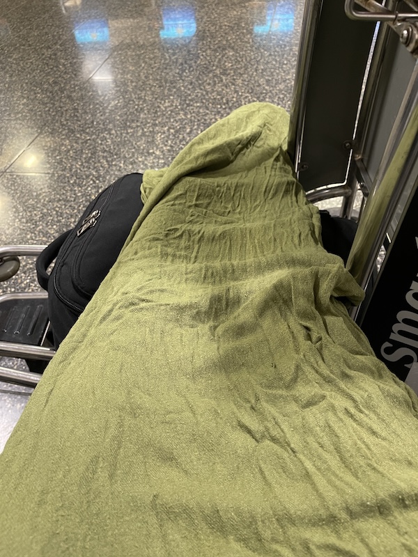 sleeping in airport tip pashmina scarf